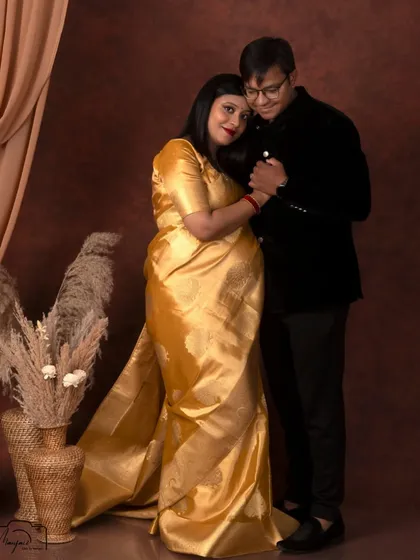 A beautiful portrait of the couple, their hands clasped, symbolizing their partnership on this journey.