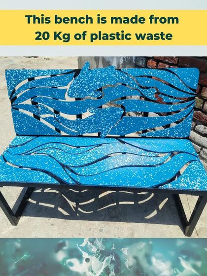Another view of the ocean-themed bench, highlighting the dolphin cutouts. This design helps start conversations about protecting marine life from plastic pollution.