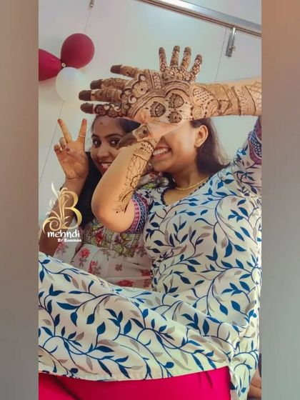 Fun and happy moments with my clients. Her friend joins in for a picture to celebrate the beautiful henna.