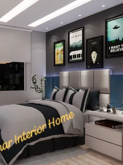 A closer look at the bed and the curated art gallery above it, which adds personality to the room.