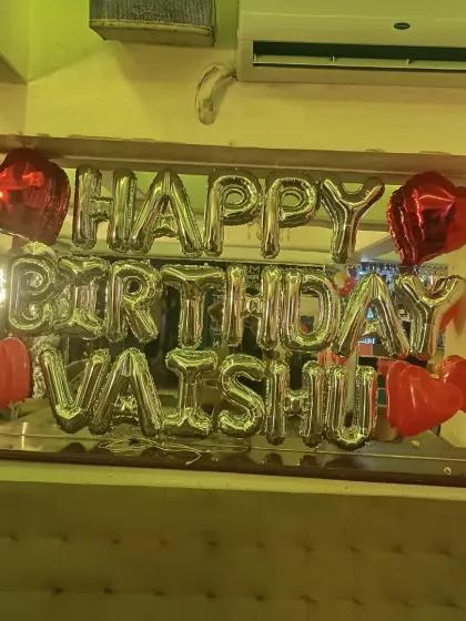 Another view of the personalized birthday banner in the cafe setting.