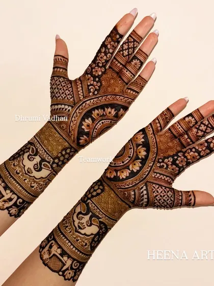 A gorgeous back-hand design featuring reverse-fill elephant motifs on the wristband, creating a bold and beautiful effect.