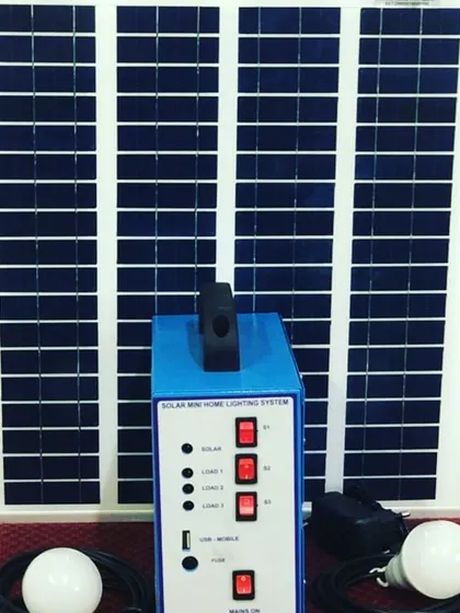 This is our complete Solar Mini Home Lighting System. The portable kit comes with a solar panel, a central power unit with a USB charging port, and two bright LED bulbs, making it a perfect plug-and-play power source for off-grid homes or emergencies.