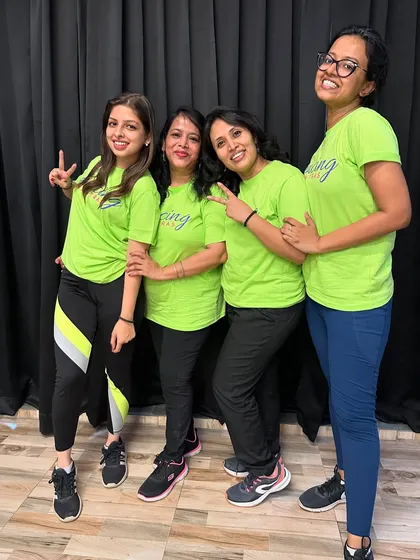 Peace and smiles from the 'Dancing Diva's' before their big performance. Confidence looks good on them!