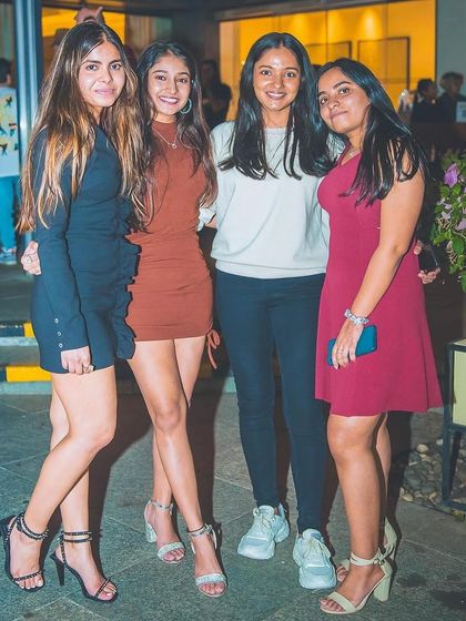 A group of friends posing for a photo.