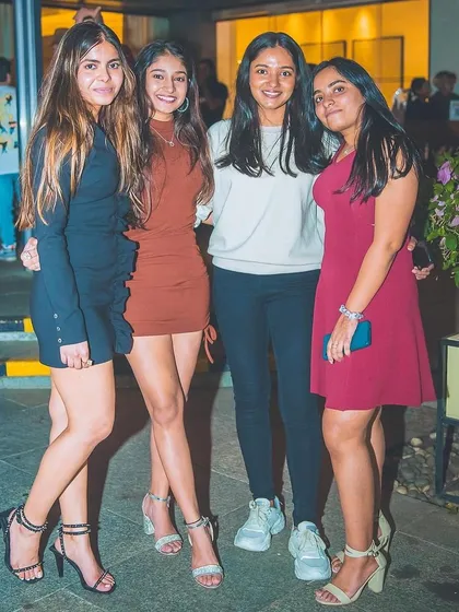 A group of friends posing for a photo.