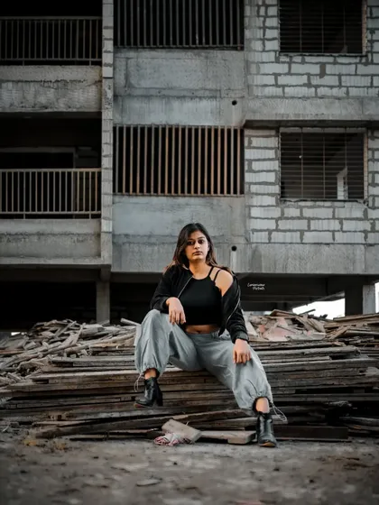 I believe any location can be a canvas. Here, we turned a raw construction site into an edgy, high-fashion backdrop. This demonstrates how I use unconventional spaces to create unique and impactful urban portraits.