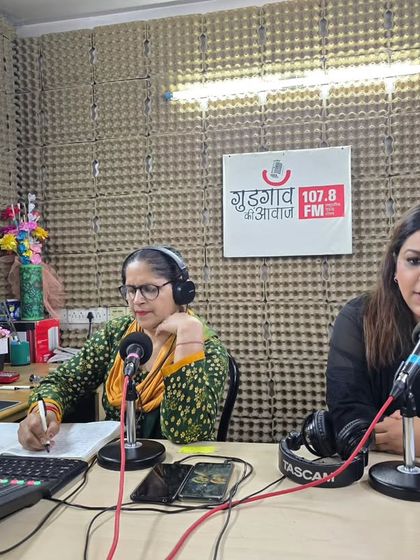 In the studio at Radio Gurgaon, discussing the challenges in implementing women's legal rights in India. I highlight issues like patriarchy, lack of awareness, and slow judicial processes that hinder true gender equality.