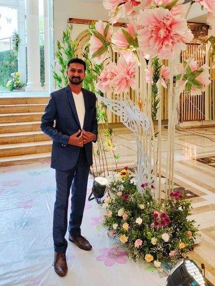At the Amravati event venue, which had some beautiful floral decorations.