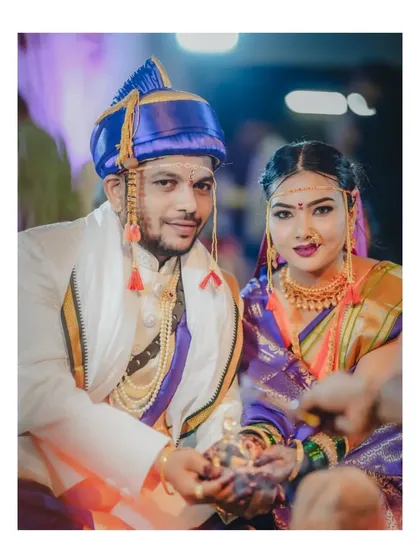 A portrait of a couple during their wedding ceremony, capturing a moment of shared ritual.