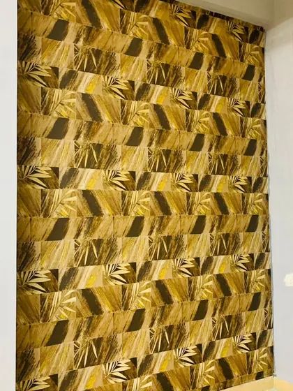 This wallpaper features a repeating geometric pattern with a natural, earthy color palette. It's a great way to add texture and a modern, structured look to a wall.