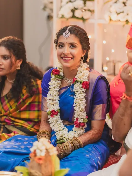 A candid shot during the ceremony. Her makeup remains flawless and fresh, allowing her to be fully present and enjoy her special moments.