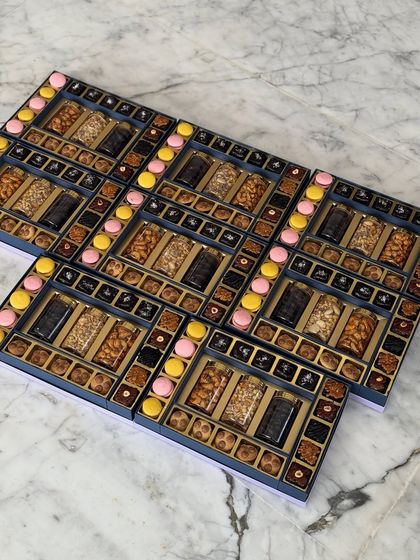 A glimpse of our grand Diwali hampers, filled with an assortment of macarons, brownie bites, and dry fruit jars. Each one is a little box of joy.