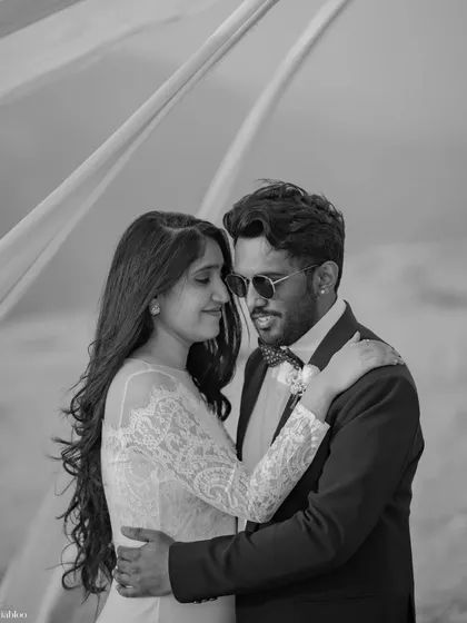 A timeless black and white portrait from the Udaipur hills shoot. This intimate moment is stripped down to pure emotion, showcasing the couple's connection without the distraction of color.