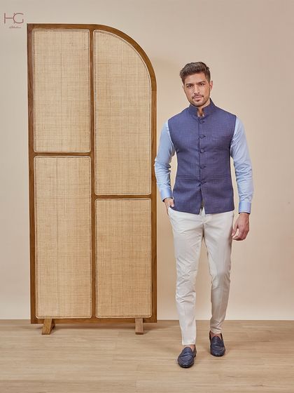 The full look showcases a timeless combination that is both smart and comfortable, suitable for a range of festive occasions.