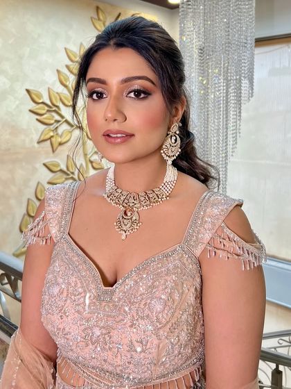 The same look in warm indoor lighting, which brings out the shimmer and adds drama.