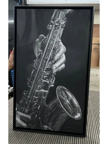 Here is the finished saxophone piece, professionally framed and ready for display. The vertical format emphasizes the length of the instrument and creates a powerful, elegant statement piece.