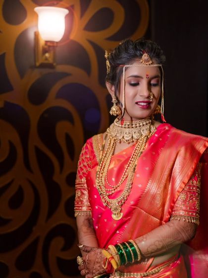 A beautiful portrait of the bride in her reception attire, looking serene and elegant.