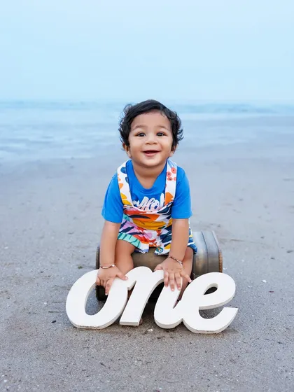 Celebrating a first birthday is a huge milestone, and what better place than the beach? I love using natural light and simple props to keep the focus on your little one's joyful spirit. This outdoor baby photoshoot is perfect for capturing their personality.