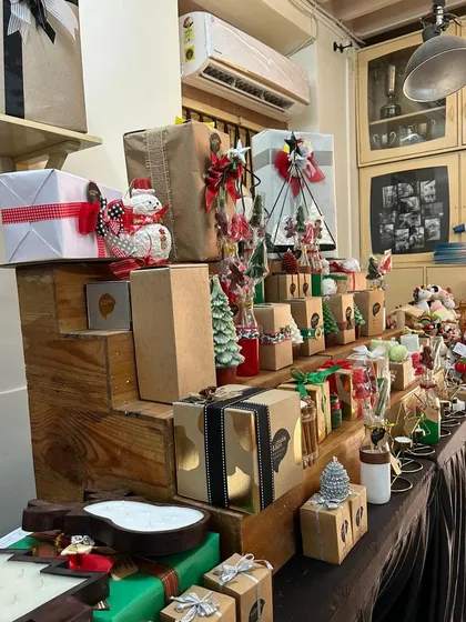 My display table, full of Christmas goodies. You can see the wide variety of candles, holders, and gift sets I offer.