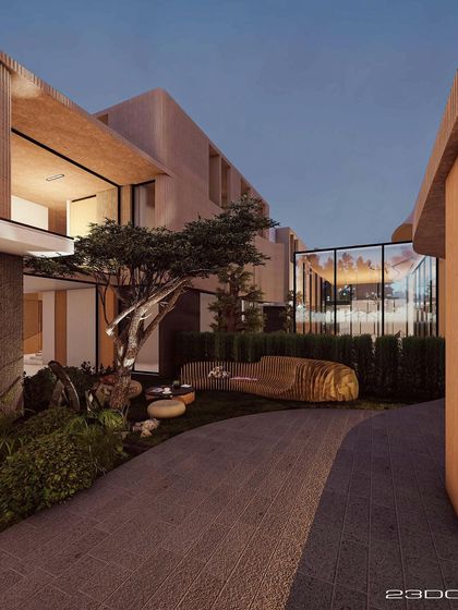 The Gemini House is a concept for two conjoined residences, united by a shared design language of earthy tones and organic forms. A glass-enclosed living area acts as a jewel box, connecting the two halves while opening up to the landscape.