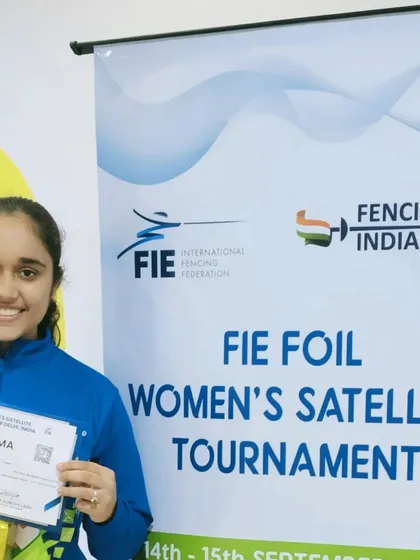 A close up of our smiling fencer with her diploma from the FIE Foil Women's Satellite Tournament. Moments like these are the culmination of countless hours of training and dedication.