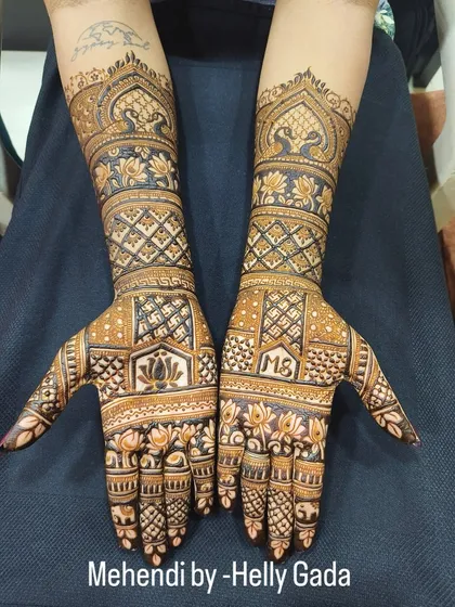 Sometimes, the beauty is in the patterns. This is a full-coverage bridal design focusing on intricate non-figurative work, with classic lotus motifs, Swastika symbols, and detailed jaal patterns.