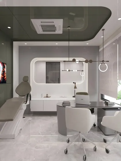 A look inside the proposed treatment room for a modern dental clinic. The design prioritizes a clean, professional aesthetic with a calming grey and white color scheme, rounded corners on the cabinetry, and large windows to bring in natural light, helping to reduce patient anxiety.