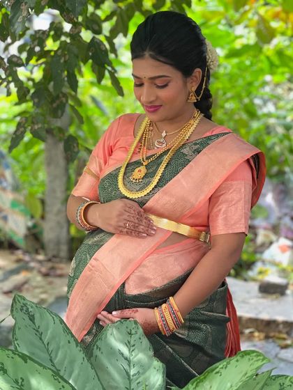A candid moment that captures the serene joy of a mom-to-be.