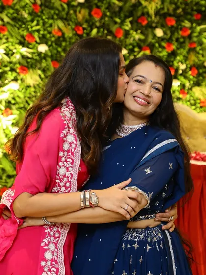 A sweet moment between mother and daughter. It’s a joy to create looks that make these moments even more special.