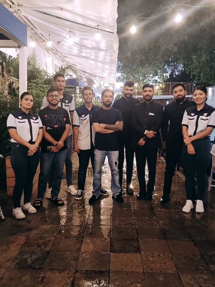 A photo of our dedicated F&B and service teams with guest Chef Aal. Collaboration and teamwork are at the heart of our successful culinary events.