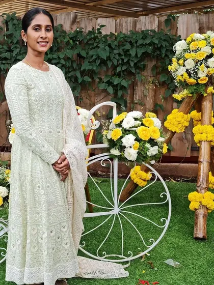The timeless elegance of Chikankari. I designed this flowing georgette gown for a client seeking a graceful and sophisticated look for a daytime event, showcasing the beauty of traditional Indian handwork in a contemporary silhouette.