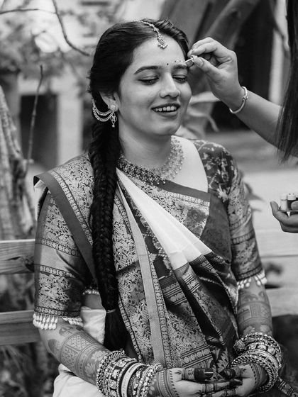 A black and white version of a candid moment, adding a timeless and emotional quality to the photo.