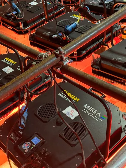 A close-up of a 16-unit FilmGear MegaBrute 1200C rig. This shows the wiring and rigging required for such a powerful lighting array.