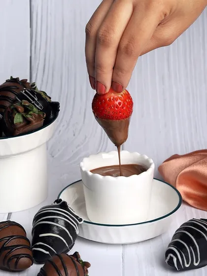 Savour the sweetness of the season with a fresh strawberry dipped in my homemade chocolate sauce. It’s a simple, perfect pleasure.