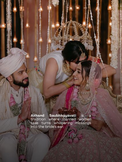 The Akhand Saubhagyavati tradition, where married women whisper blessings into the bride's ear. We design intimate spaces that allow for these quiet, heartfelt moments to unfold naturally.