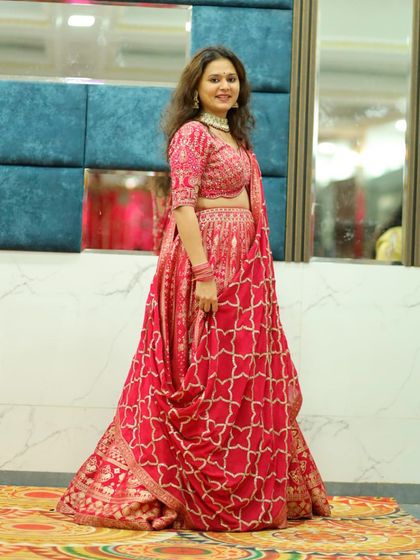 Another shot of our client looking radiant in her red Banarasi rental. I love making these moments happen.