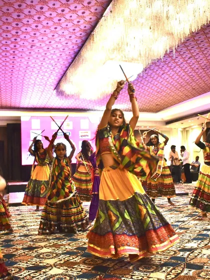 The energy on stage during our Dandiya performance at the summer camp finale was just electric! Look at these kids performing Garba with such grace and confidence in their beautiful costumes.
