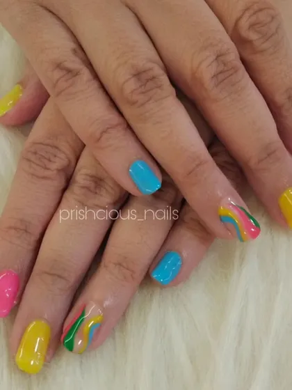 Another shot of the colorful vacation manicure. These nails are guaranteed to make you smile.