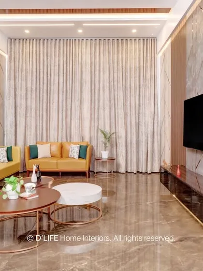 A closer look at the vibrant yellow living room, showcasing the geometric patterns on the wall and the elegant, long curtains that add a sense of height.