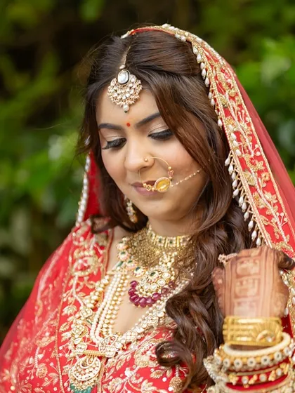 A close-up of Jheel's soft bridal makeup. The focus is on glowing skin and subtly defined eyes, perfect for a day wedding.