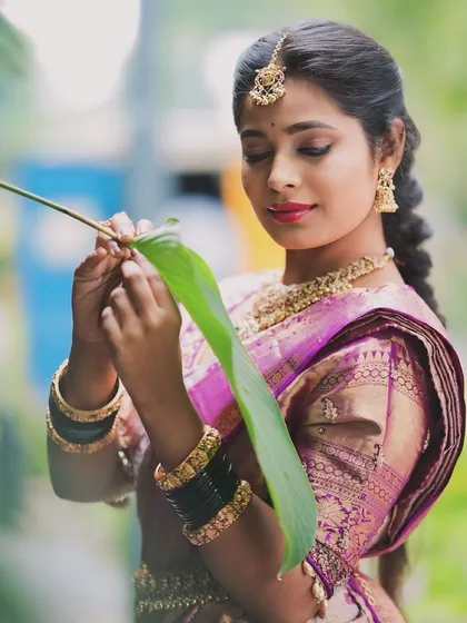 Embrace timeless elegance with our traditional Indian wear collection. This look features a classic silk saree paired with authentic temple jewelry, perfect for cultural events or a classic photoshoot.