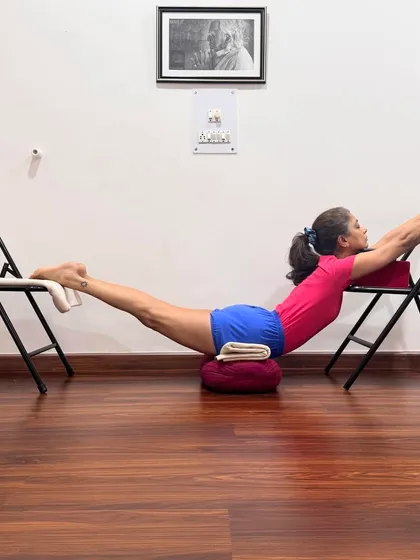 This supported variation of Salabhasana (Locust Pose) uses two chairs to lift the body. This allows the practitioner to experience the full extension of the spine without strain, building strength in the back muscles.