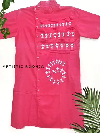 This vibrant pink kurta features traditional Warli art, with dancing figures painted in a spiral. Warli art tells stories of community and celebration, making it a perfect design for a unique and meaningful ethnic garment.