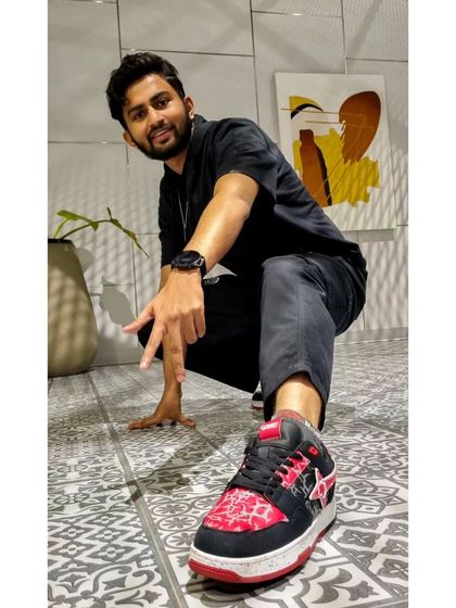 A duplicate of me showing off some cool shoes. Style and adventure can go hand in hand.