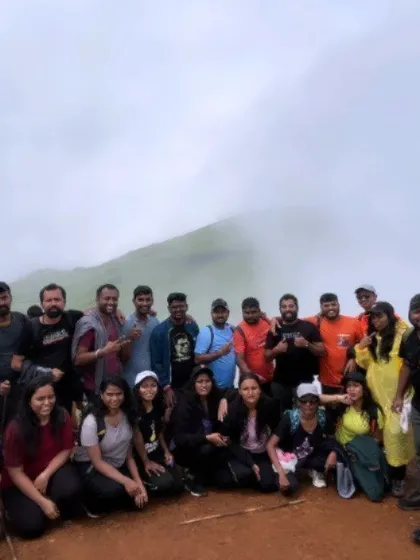 A group photo from our last Nethravathi batch, with the misty mountains creating a perfect backdrop.