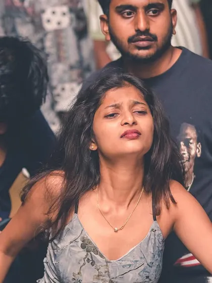 The look of someone completely taken by the beat.