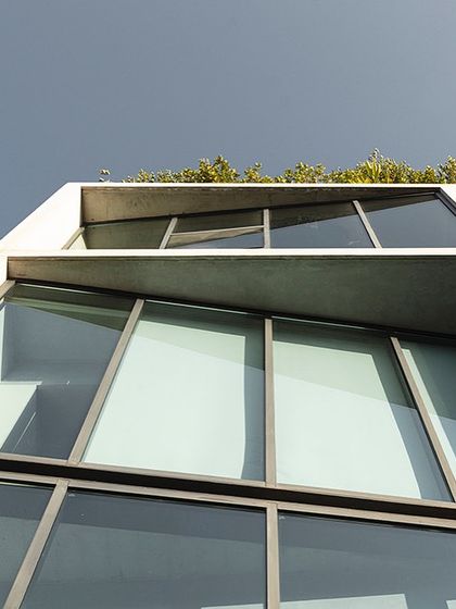 A duplicate of ID 68, this shot emphasizes the geometric composition of the windows and concrete slabs. The design of our own office was a chance to distill and express the narratives and pursuits that drive all our projects.