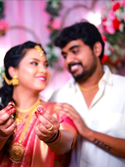A playful and happy moment as the couple shows off their new rings. I love capturing the fun and excitement of engagement parties.
