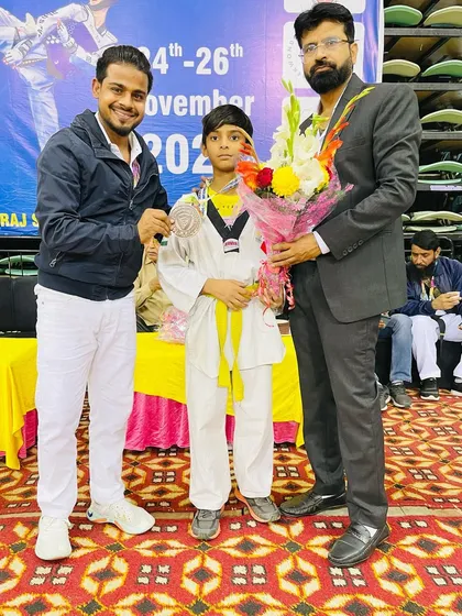 Kaif celebrating his bronze medal win at the 5th Open International Taekwondo Championship. A great effort and a proud moment for him and the academy.